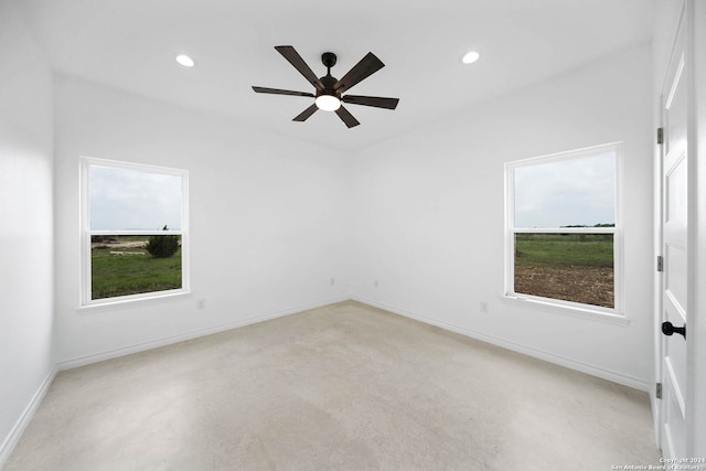 spare room featuring ceiling fan