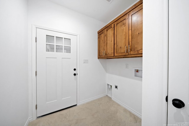 laundry room with cabinets, hookup for a washing machine, electric dryer hookup, and light colored carpet