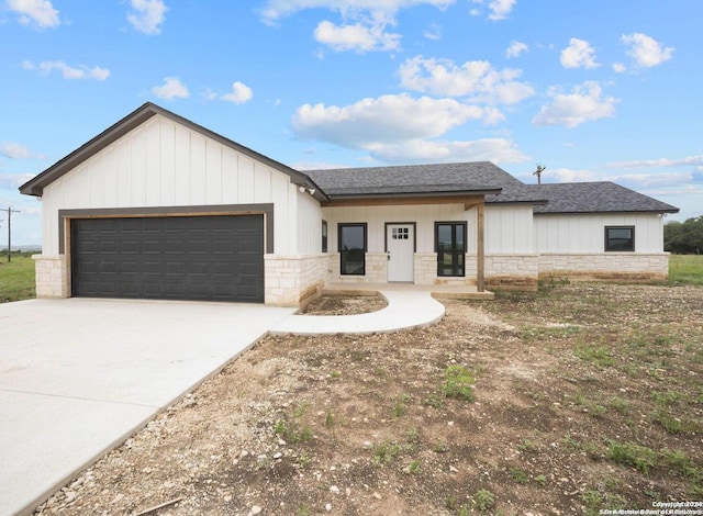 view of front of property with a garage