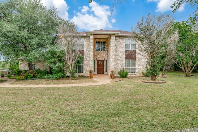 view of front of home with a front lawn