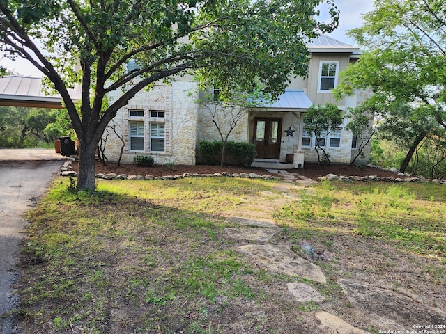 view of front of property with a carport