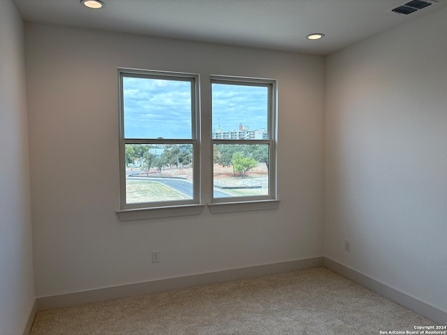 view of carpeted spare room