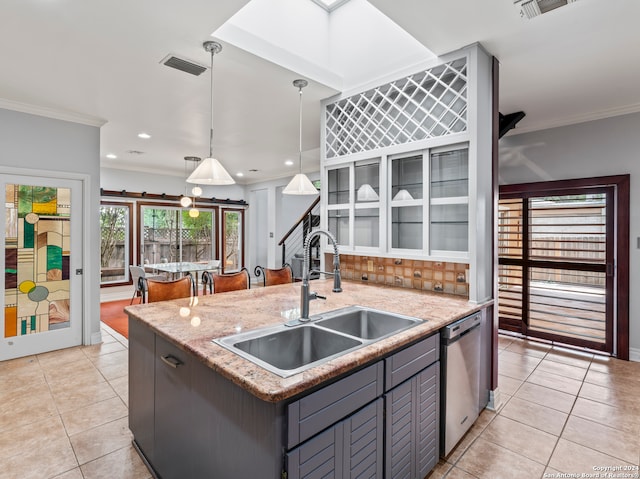 kitchen featuring stainless steel dishwasher, decorative light fixtures, light tile patterned flooring, ornamental molding, and sink