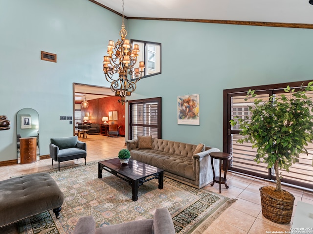 tiled living room with high vaulted ceiling, a chandelier, and ornamental molding