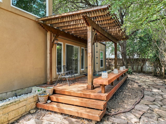 wooden deck with a pergola