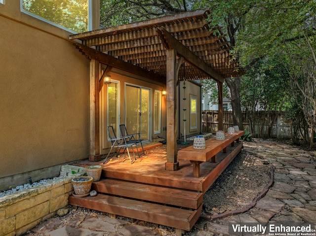 deck featuring a pergola