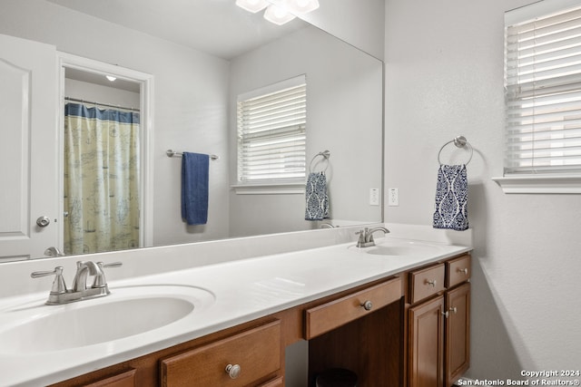 bathroom with double vanity