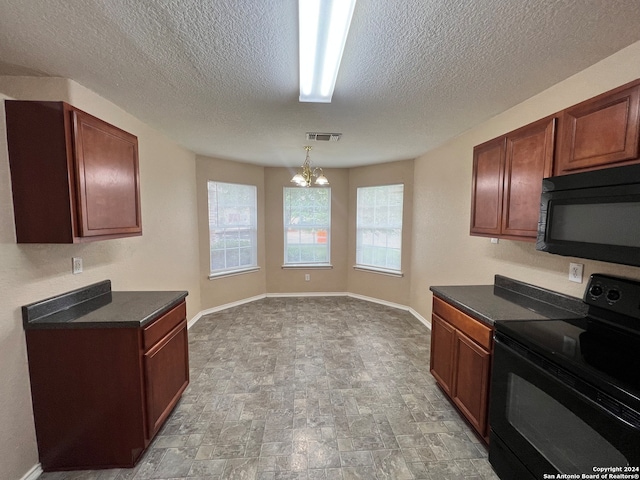 kitchen with a textured ceiling, black appliances, pendant lighting, and a chandelier