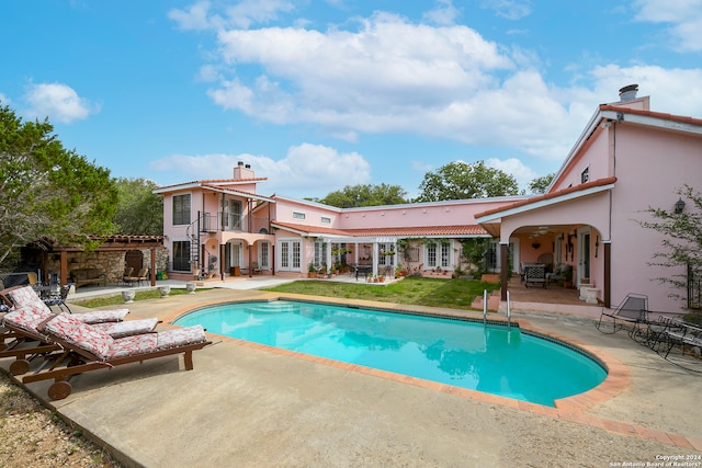 view of pool featuring a patio