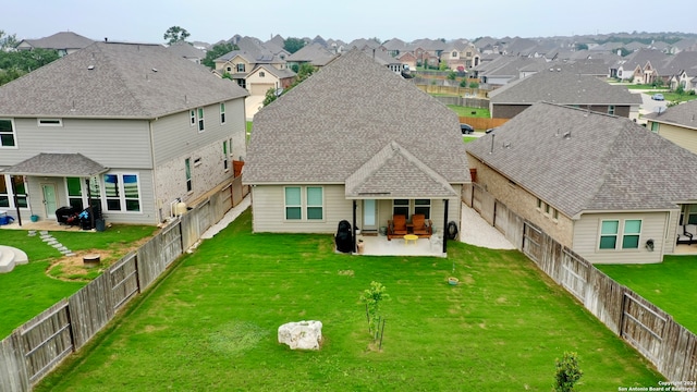 exterior space featuring a yard and a patio