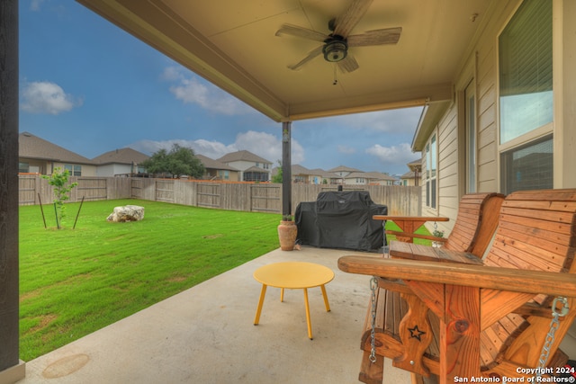 view of patio featuring ceiling fan and area for grilling