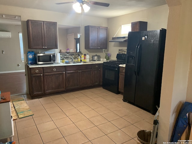 kitchen featuring light tile flooring, dark brown cabinetry, black appliances, sink, and ceiling fan