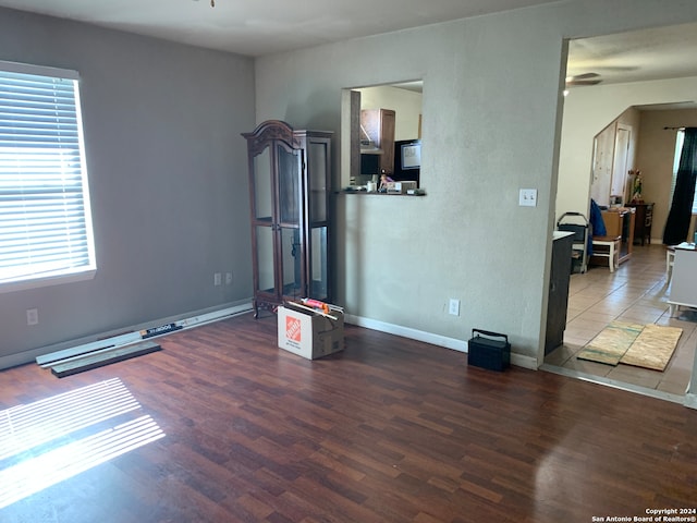 spare room featuring wood-type flooring