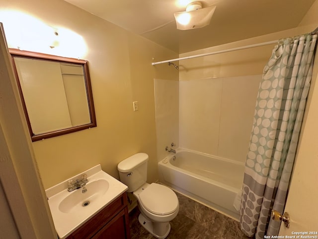 full bathroom featuring vanity, toilet, tile floors, and shower / bath combo with shower curtain