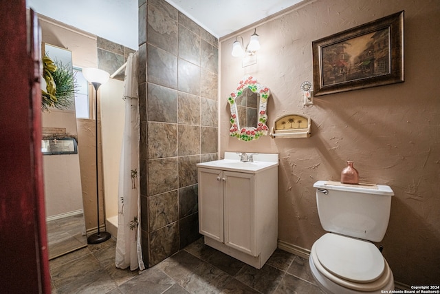 full bathroom with tile walls, oversized vanity, shower / tub combo, toilet, and tile floors