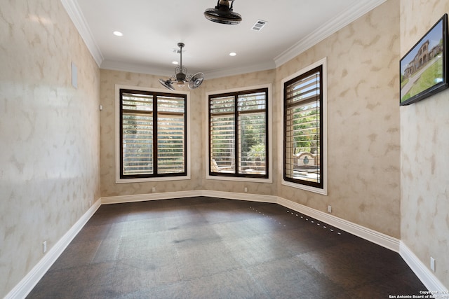 unfurnished room with ornamental molding and a chandelier