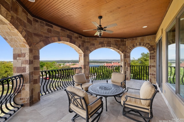 view of patio / terrace featuring ceiling fan