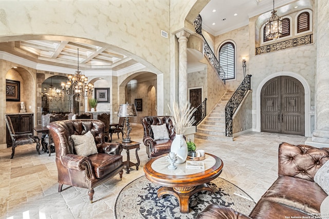 living room with a towering ceiling, coffered ceiling, beam ceiling, tile floors, and an inviting chandelier