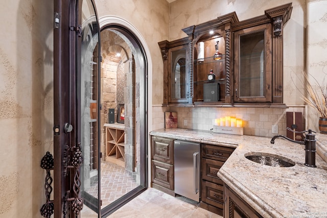 interior space featuring sink and light tile floors