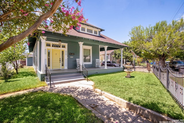 view of front of property with a front lawn and a porch