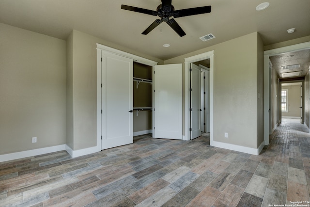 unfurnished bedroom with a closet, ceiling fan, and light wood-type flooring