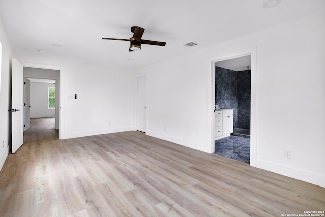 unfurnished room featuring wood-type flooring and ceiling fan