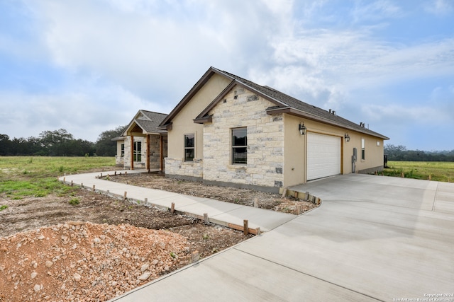 view of front of property with a garage