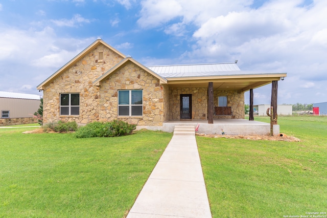 view of front of house with a front yard