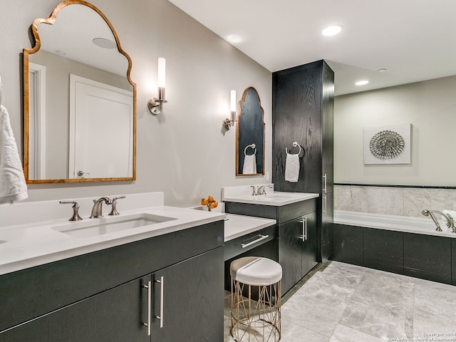 bathroom with double vanity, tile floors, and tiled bath