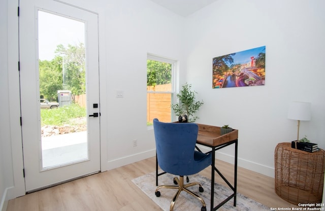 office space with light hardwood / wood-style floors