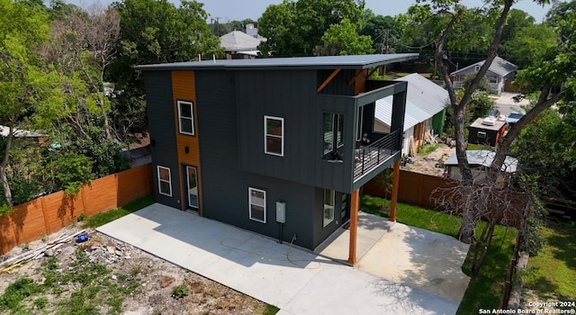 rear view of house featuring a patio area