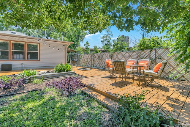 view of yard with a wooden deck