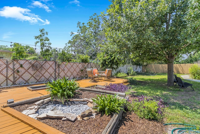 view of yard featuring a deck