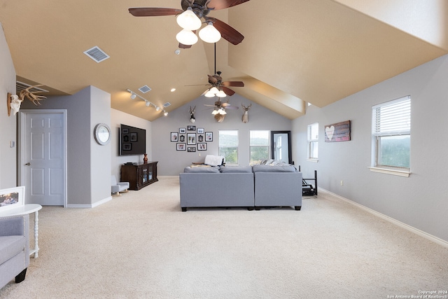 carpeted living room with lofted ceiling