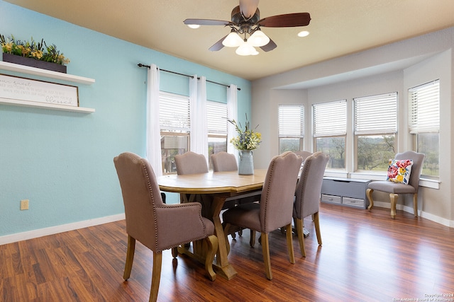 dining room featuring dark wood-type flooring and ceiling fan