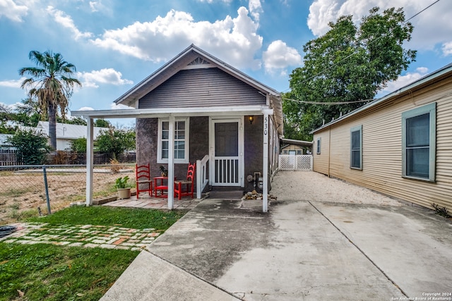 view of front of house with a patio area