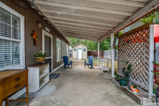 view of terrace featuring a storage unit