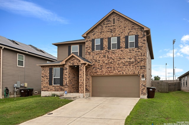 view of front facade with a front yard and a garage