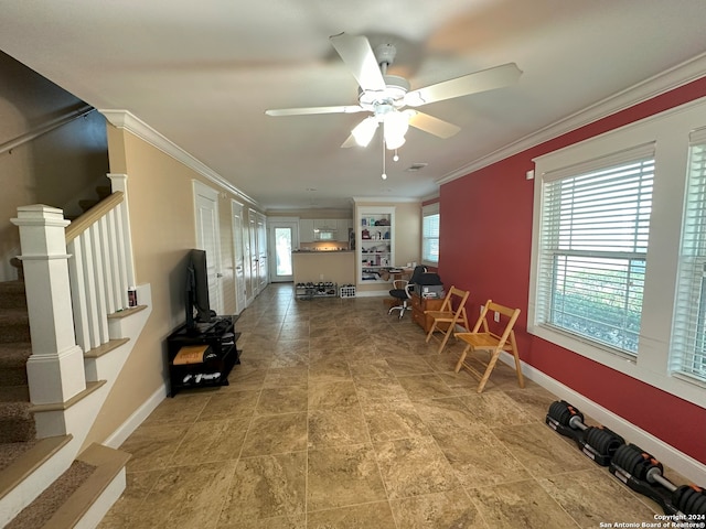 dining room featuring tile floors, plenty of natural light, ceiling fan, and crown molding