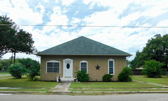 bungalow with a front yard