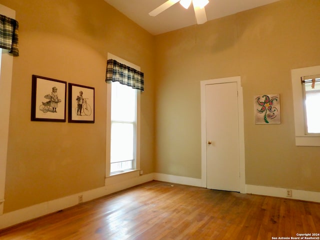 unfurnished room featuring wood-type flooring and ceiling fan