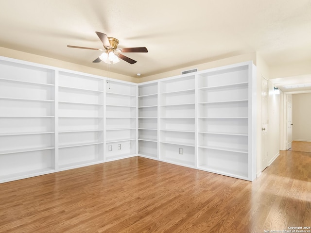 unfurnished room with ceiling fan and light hardwood / wood-style floors