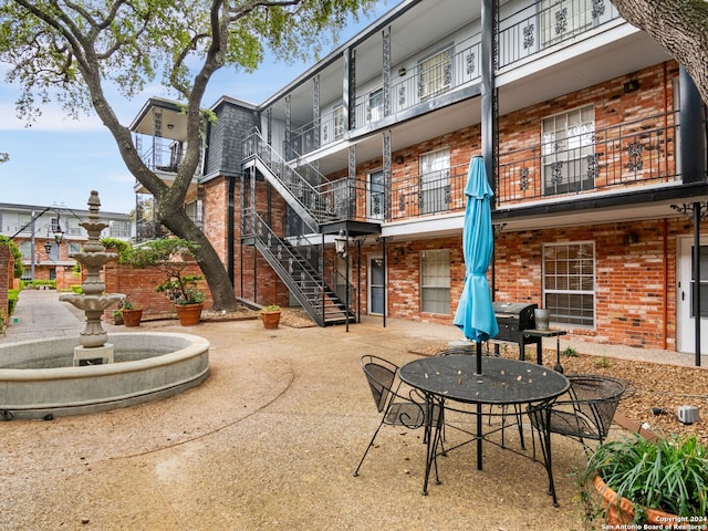 view of terrace with a balcony