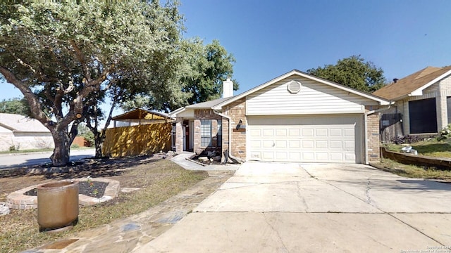 ranch-style house featuring a garage