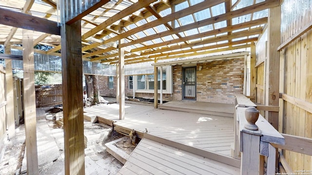 wooden terrace with a pergola