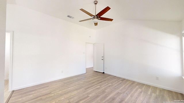 unfurnished room with high vaulted ceiling, ceiling fan, and light hardwood / wood-style flooring