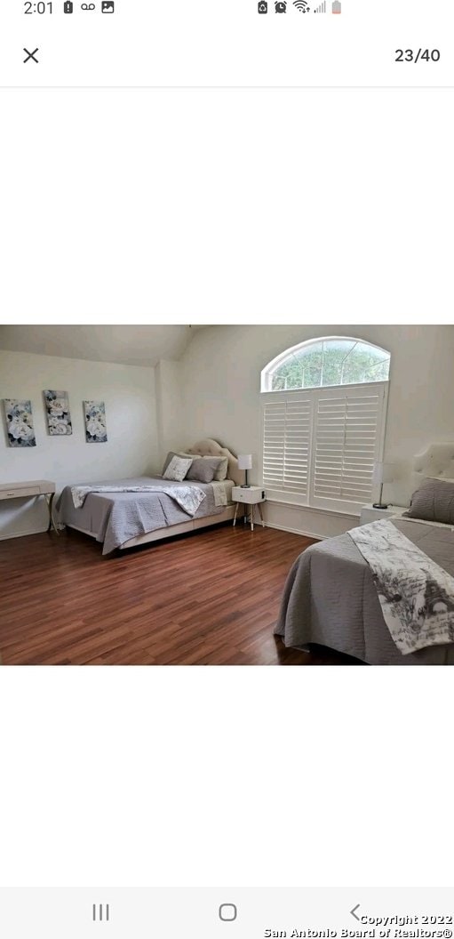 bedroom featuring hardwood / wood-style floors