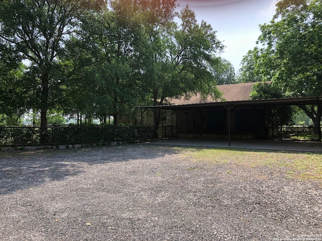 view of yard with a carport