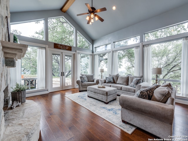 sunroom with vaulted ceiling with beams, ceiling fan, and french doors