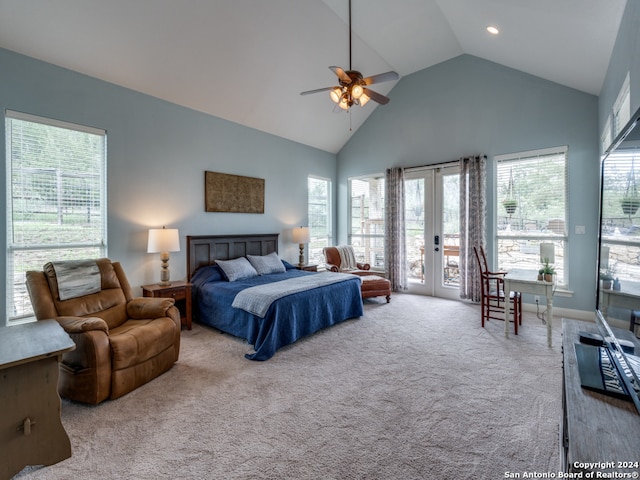 bedroom featuring access to exterior, french doors, multiple windows, and ceiling fan